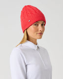Daily Sports ICable Knit Hat in poppy red– women's chunky cable-knit golf beanie with ribbed cuff and silver logo pin, side view