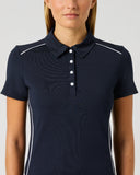 Daily Sports Dark Navy Piping Short Sleeve Polo close-up of deep navy fabric with white contrast shoulder and side piping trim, classic polo collar and white pearl button placket detail