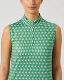 A sleeveless high-neck top with a green and white geometric pattern, shown on a model against a light gray background.