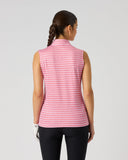 A woman viewed from the back wearing a sleeveless high-neck top with a pink and white gingham check pattern, paired with black pants, against a light gray studio background.