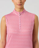 A sleeveless high-neck top with a red and white gingham pattern, worn by a model against a light gray studio background.