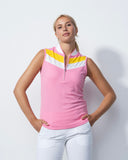 Woman wearing a pink sleeveless shirt with a yellow and white stripe on a light gray background