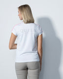 Woman wearing a white t-shirt with 'QUEEN' printed on the back against a light gray background