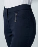 Dark navy pants with a zipper on a light gray background