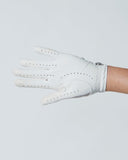 White leather glove on a white background
