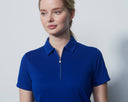 Woman wearing a blue polo shirt with a zipper on a white background