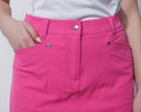 Close-up of bright pink skort with a white background