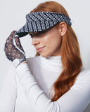 Woman wearing a visor, gloves, and a white long-sleeve shirt against a light gray background