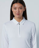 Woman wearing a white long-sleeve shirt with a collar against a plain background